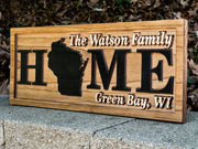 Home with State Family Name sign
