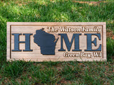 Home with State Family Name sign